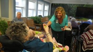 Shari Yahner with a resident 