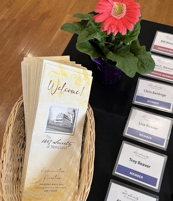 a stack of fliers for the 1867 society appreciation reception