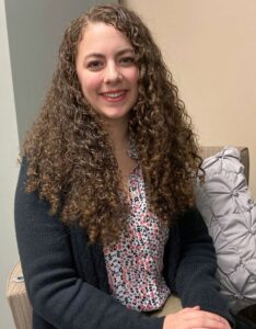 Alexis Conkle, MSW, sitting inside of homeland