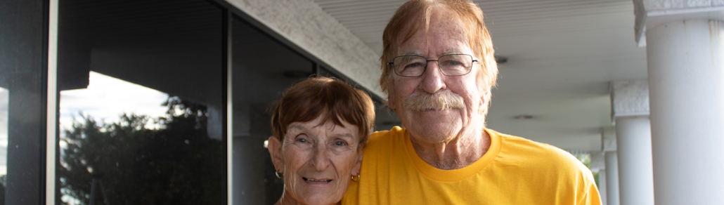 banner of andy and sherry lank smiling together