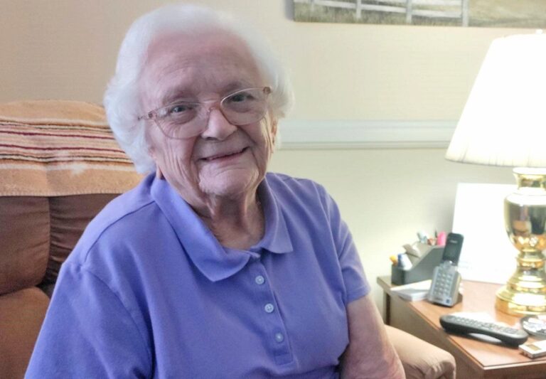 resident kitty deaven smiling in her residence