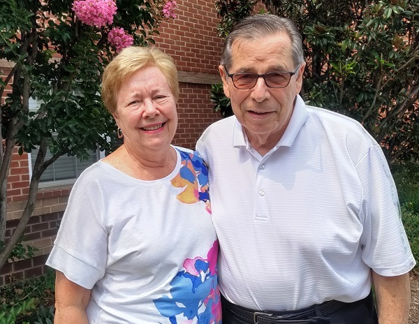 Volunteers Janet and David Young smiling together