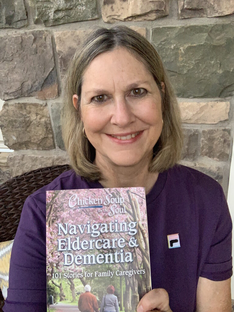 pattie craumer holding chicken soup for the soul - eldercare
