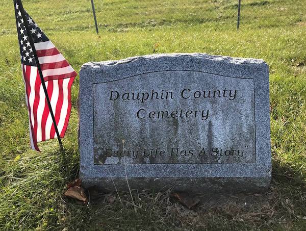 grave reading 'every life has a story'