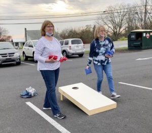 homeland staff playing cornhole